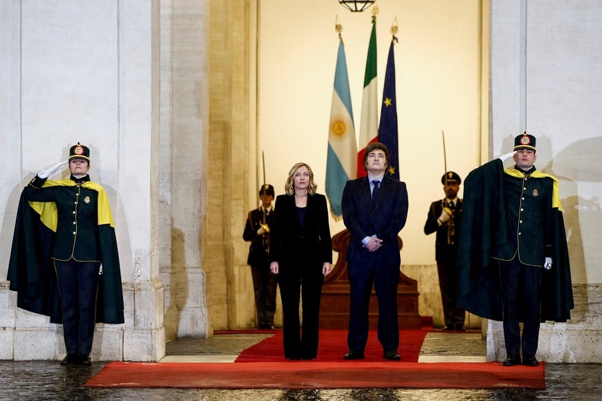 Italian Prime Minister Giorgia Meloni and Argentina's President Javier Milei meet at Chigi Palace, in Rome, Italy, December 13, 2024. REUTERS/Guglielmo Mangiapane     TPX IMAGES OF THE DAY