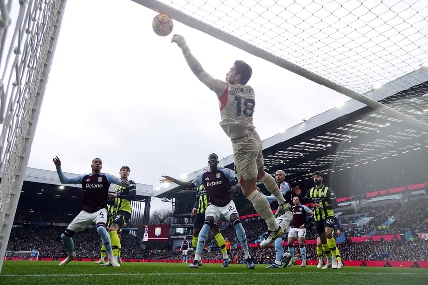 Soccer Football - Premier League - Aston Villa v Manchester City - Villa Park, Birmingham, Britain - December 21, 2024
Manchester City's Stefan Ortega saves from Aston Villa's Pau Torres REUTERS/Hannah Mckay EDITORIAL USE ONLY. NO USE WITH UNAUTHORIZED AUDIO, VIDEO, DATA, FIXTURE LISTS, CLUB/LEAGUE LOGOS OR 'LIVE' SERVICES. ONLINE IN-MATCH USE LIMITED TO 120 IMAGES, NO VIDEO EMULATION. NO USE IN BETTING, GAMES OR SINGLE CLUB/LEAGUE/PLAYER PUBLICATIONS. PLEASE CONTACT YOUR ACCOUNT REPRESENTATIVE FOR FURTHER DETAILS..     TPX IMAGES OF THE DAY