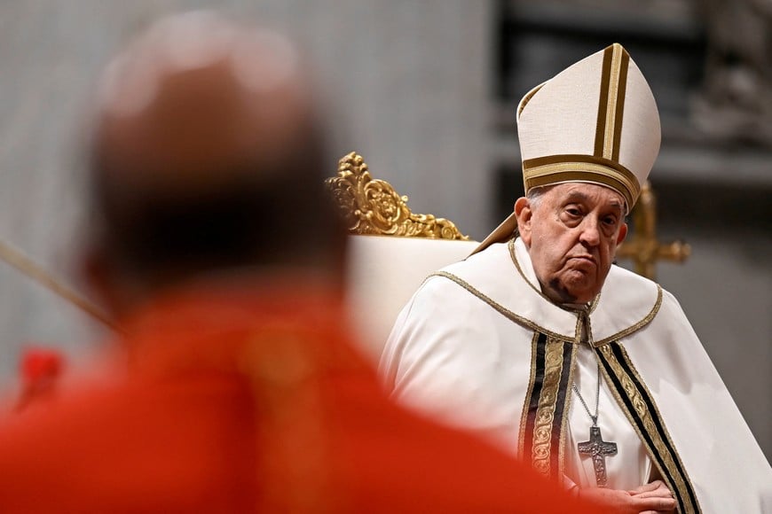 Pope Francis, with a large bruise on his chin, attends a consistory ceremony to elevate Roman Catholic prelates to the rank of cardinal, in Saint Peter's Basilica at the Vatican, December 7, 2024.  Vatican Media/­Simone Risoluti/Handout via REUTERS    ATTENTION EDITORS - THIS IMAGE WAS PROVIDED BY A THIRD PARTY.