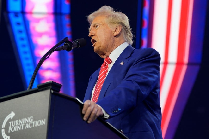 U.S. President-elect Donald Trump speaks at Turning Point USA's AmericaFest in Phoenix, Arizona, U.S., December 22, 2024.  REUTERS/Cheney Orr