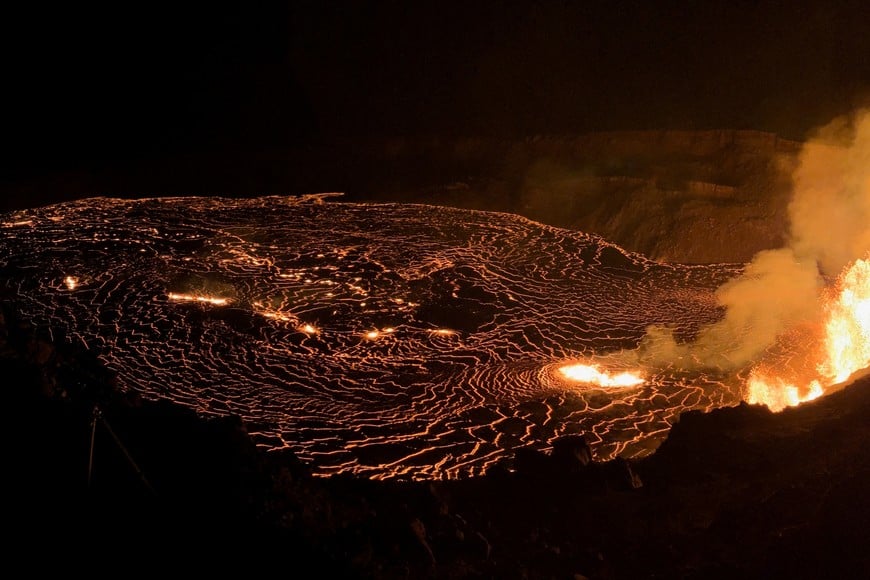 Lava erupts from vents on the west part of the caldera wall, feeding lava flows that cover the area of Halema?uma?u crater during a new eruption within the summit caldera Kaluapele, which began early at the Kilauea volcano in Hawaii, U.S. December 23, 2024.  USGS/M. Zoeller/Handout via REUTERS. 
THIS IMAGE HAS BEEN SUPPLIED BY A THIRD PARTY