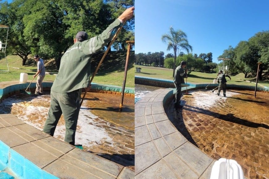 Personal municipal limpiando piletón Parque del Sur.