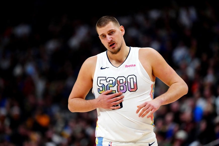 Dec 23, 2024; Denver, Colorado, USA; Denver Nuggets center Nikola Jokic (15) during the second quarter against the Phoenix Suns at Ball Arena. Mandatory Credit: Ron Chenoy-Imagn Images