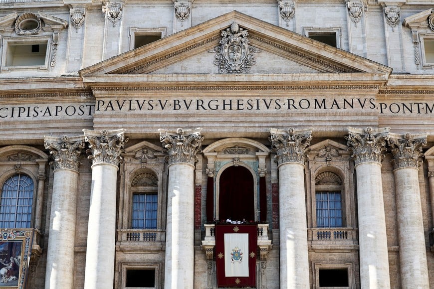 Pope Francis delivers his traditional Christmas Day Urbi et Orbi speech to the city and the world from the main balcony of St. Peter's Basilica at the Vatican, December 25, 2024. REUTERS/Yara Nardi