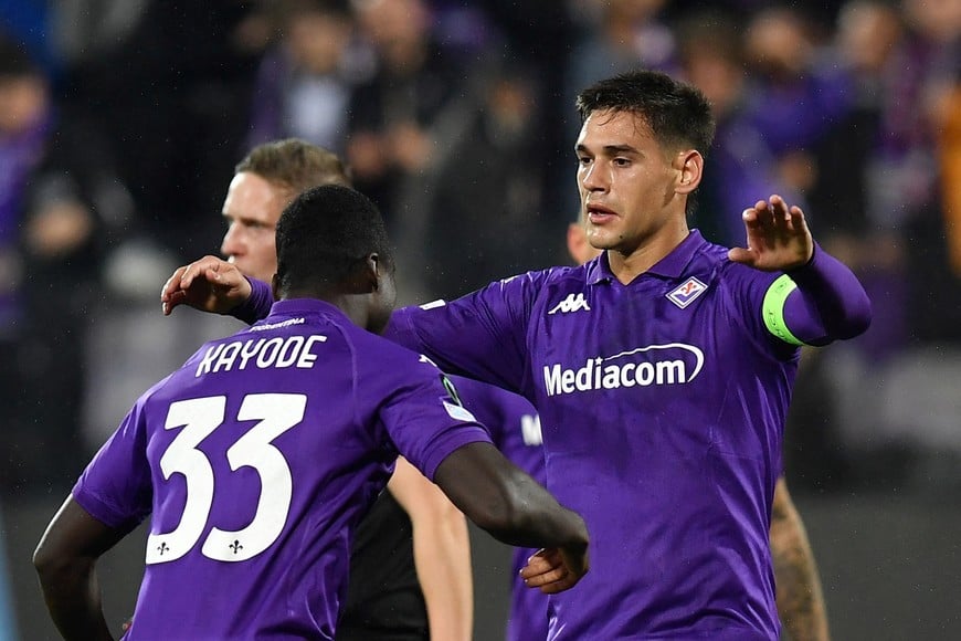 Soccer Football - Europa Conference League - Fiorentina v Pafos - Stadio Artemio Franchi, Florence, Italy - November 28, 2024
Fiorentina's Lucas Martinez Quarta celebrates scoring their third goal with Michael Kayode REUTERS/Jennifer Lorenzini