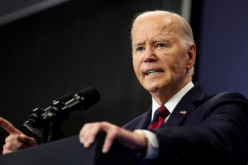 FILE PHOTO: U.S. President Joe Biden delivers remarks on the economy at the Brookings Institution in Washington, DC, U.S. December 10, 2024. REUTERS/Kevin Lamarque/File Photo