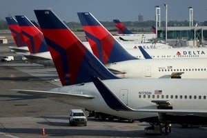 FILE PHOTO: Delta Air Lines planes are seen at John F. Kennedy International Airport on the July 4th weekend in Queens, New York City, U.S., July 2, 2022. REUTERS/Andrew Kelly/File Photo