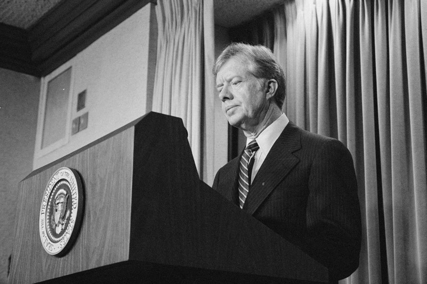 FILE PHOTO: U.S. President Jimmy Carter announces new sanctions against Iran in retaliation for taking U.S. hostages, at the White House in Washington, U.S. April 7, 1980.  Library of Congress/Marion S. Trikosko/Handout via REUTERS/File Photo   THIS IMAGE HAS BEEN SUPPLIED BY A THIRD PARTY.