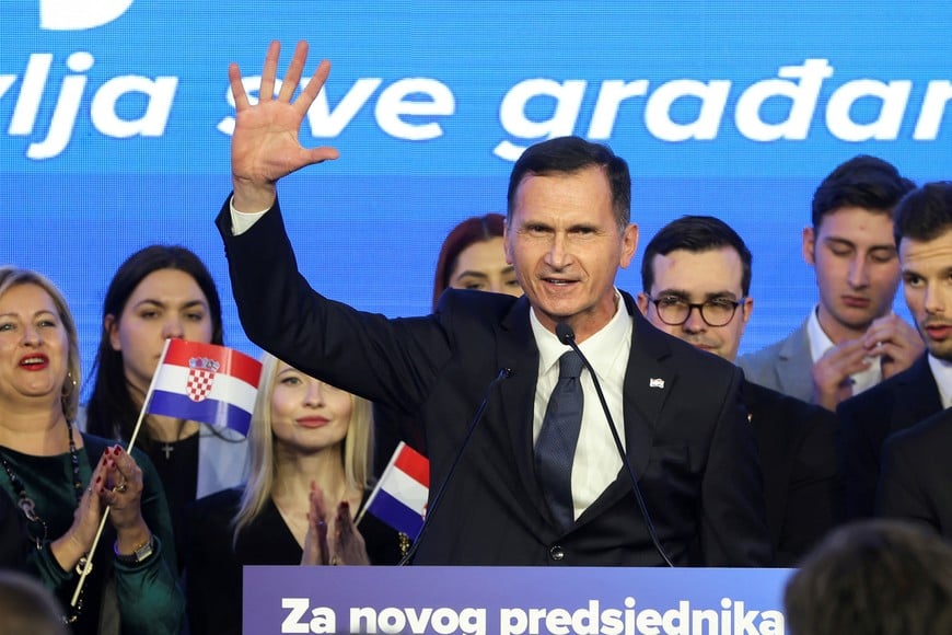 Presidential candidate Dragan Primorac reacts on stage after results in Croatia's presidential election in Zagreb, Croatia, December 29, 2024. REUTERS/Djordje Kojadinovic