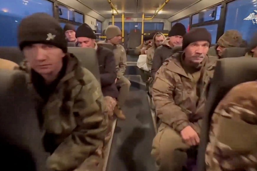 An image from a video, released by Russian Defence Ministry, shows what it said to be captured Russian service personnel in a bus following the latest exchange of prisoners of war at an unknown location in the course of Russia-Ukraine conflict, in a still image from video released December 30, 2024. Russian Defence Ministry/Handout via REUTERS ATTENTION EDITORS - THIS IMAGE HAS BEEN SUPPLIED BY A THIRD PARTY. NO RESALES. NO ARCHIVES. MANDATORY CREDIT. WATERMARK FROM SOURCE.