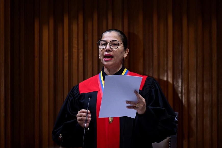 Venezuela's President of the Constitutional Chamber of the Supreme Court of Justice, Tania D'Amelio, reads a statement imposing a fine on TikTok, at the Supreme Court of Justice in Caracas, Venezuela December 30, 2024. REUTERS/Gaby Oraa