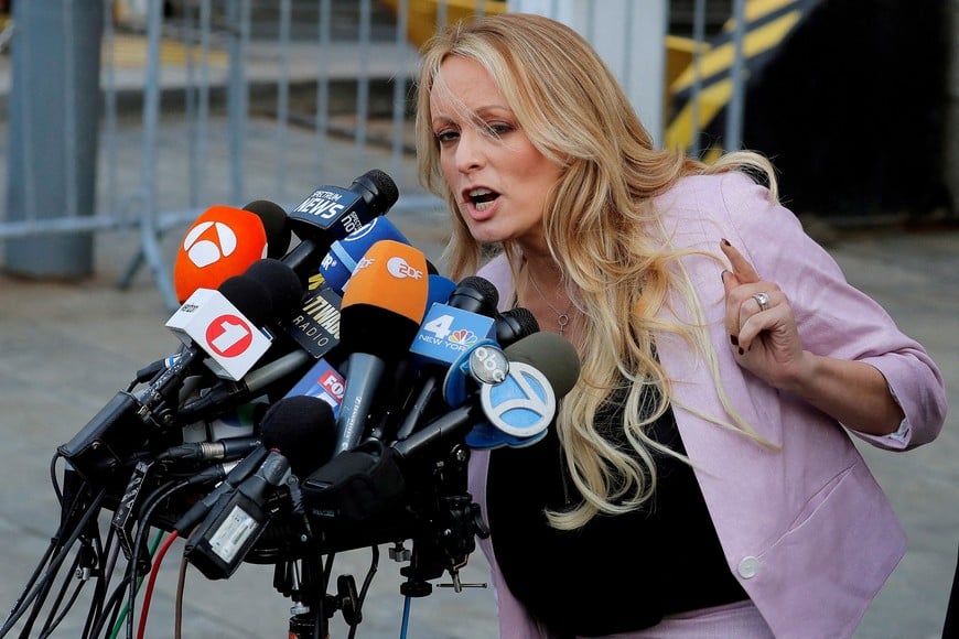 FILE PHOTO: Adult-film actress Stephanie Clifford, also known as Stormy Daniels, speaks as she departs federal court in the Manhattan borough of New York City, New York, U.S., April 16, 2018. REUTERS, Lucas Jackson/File Photo