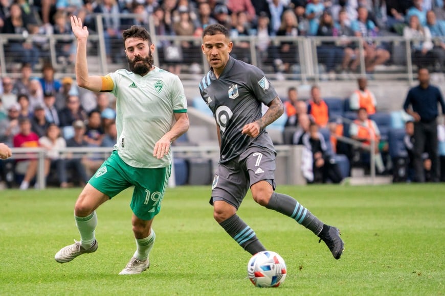 Oct 10, 2021; Saint Paul, Minnesota, USA; Colorado Rapids midfielder Jack Price (19) defends against Minnesota United midfielder Franco Fragapane (7) in the second half at Allianz Field. Mandatory Credit: Matt Blewett-USA TODAY Sports