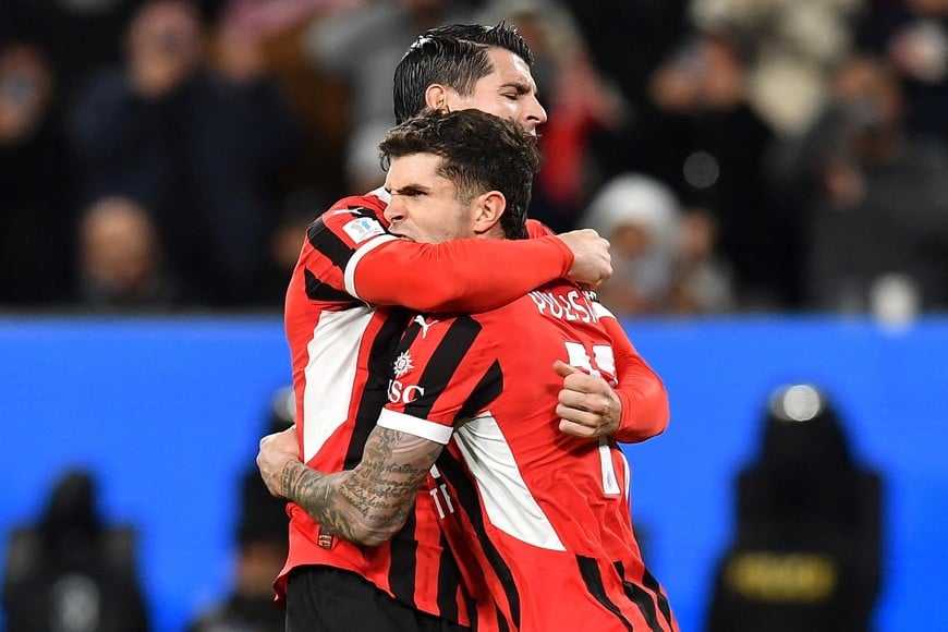 Soccer Football - Italian Super Cup - Semi Final - Juventus v AC Milan - Al Awwal Park, Riyadh, Saudi Arabia - January 3, 2025
AC Milan's Christian Pulisic celebrates scoring their first goal with Alvaro Morata REUTERS/Jennifer Lorenzini