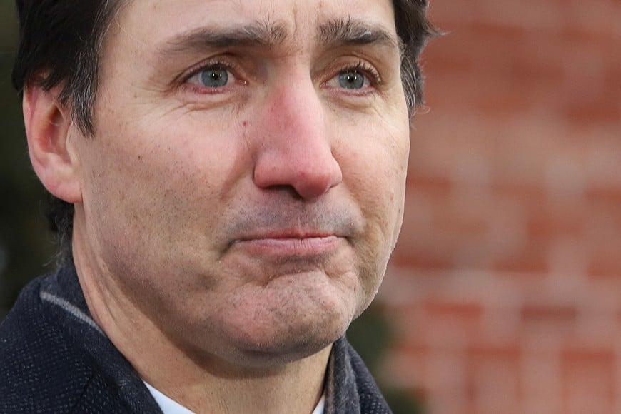 Canada's Prime Minister Justin Trudeau speaks to reporters, announcing he intends to step down as Liberal Party leader and Prime Minister, but he will stay on in his post until a replacement has been chosen, from his Rideau Cottage residence in Ottawa, Ontario, Canada, January 6, 2025. REUTERS/Patrick Doyle