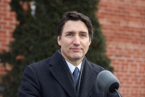 Canada's Prime Minister Justin Trudeau speaks to reporters, announcing he intends to step down as Liberal Party leader and Prime Minister, but he will stay on in his post until a replacement has been chosen, from his Rideau Cottage residence in Ottawa, Ontario, Canada, January 6, 2025. REUTERS/Patrick Doyle     TPX IMAGES OF THE DAY