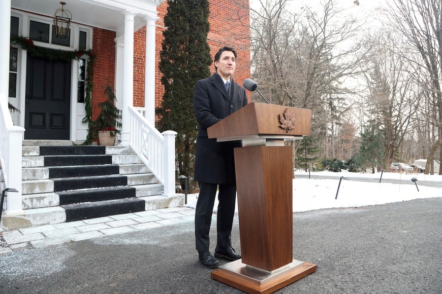 Canada's Prime Minister Justin Trudeau speaks to reporters, announcing he intends to step down as Liberal Party leader, but he will stay on in his post until a replacement has been chosen, from his Rideau Cottage residence in Ottawa, Ontario, Canada, January 6, 2025. REUTERS/Patrick Doyle