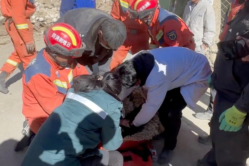 Rescue teams tend to casualties in the aftermath of an earthquake in a location given as Shigatse City, Tibet Autonomous Region, China, January 7, 2025, in this screengrab obtained from a handout video. Tibet Fire and Rescue/Handout via REUTERS    THIS IMAGE HAS BEEN SUPPLIED BY A THIRD PARTY. NO RESALES. NO ARCHIVES. MANDATORY CREDIT