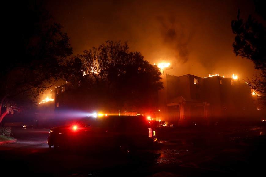 Eaton Fire burns in Pasadena, California, U.S. January 8, 2025. REUTERS/Mario Anzuoni