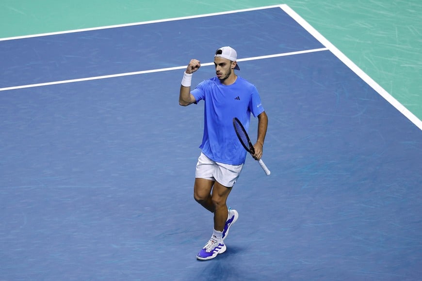 Tennis - Davis Cup Finals - Quarter Final - Italy v Argentina - Palacio de Deportes Jose Maria Martin Carpena Arena, Malaga, Spain - November 21, 2024
Argentina's Francisco Cerundolo reacts during his match against Italy's Lorenzo Musetti REUTERS/Juan Medina