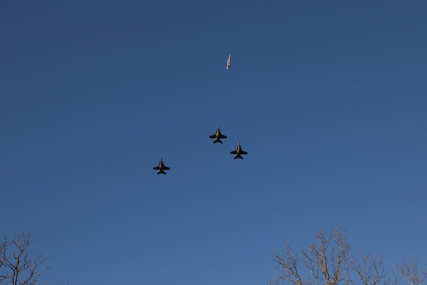 U.S. Navy F-18 jets perform a missing man formation before a private funeral service for U.S. President Jimmy Carter at Maranatha Baptist Church in Plains, Georgia, U.S. January 9, 2025.  REUTERS/Alyssa Pointer