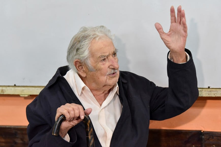 Uruguay's former President Jose Mujica gestures on the day he casts his vote for a presidential election run-off between centre-left candidate Yamandu Orsi and the candidate of the ruling conservative coalition Alvaro Delgado, at a polling station, in Montevideo, Uruguay November 24, 2024. REUTERS/Martin Varela Umpierrez