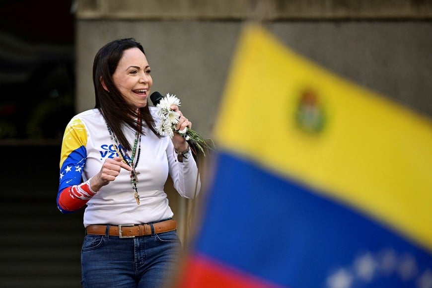 Venezuelan opposition leader Maria Corina Machado addresses supporters at a protest ahead of the Friday inauguration of President Nicolas Maduro for his third term, in Caracas, Venezuela January 9, 2025. REUTERS/Gaby Oraa