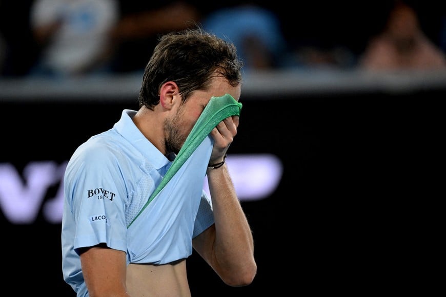 Tennis - Australian Open - Melbourne Park, Melbourne, Australia - January 16, 2025
Russia's Daniil Medvedev wipes sweat off his face during his second round match against Learner Tien of the U.S. REUTERS/Jaimi Joy     TPX IMAGES OF THE DAY