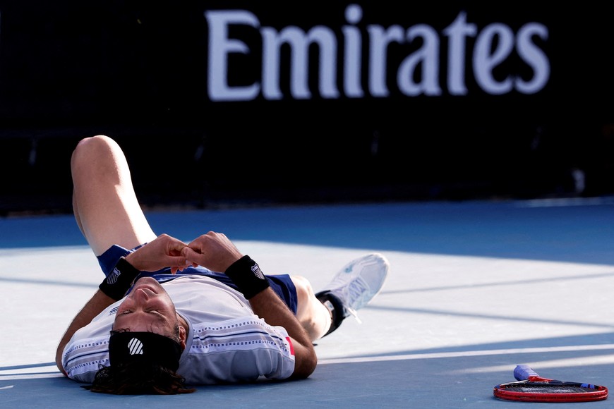 Tennis - Australian Open - Melbourne Park, Melbourne, Australia - January 16, 2025
Argentina's Tomas Martin Etcheverry reacts after sustaining an injury during his second round match against Marcos Giron of the U.S. REUTERS/Kim Kyung-Hoon