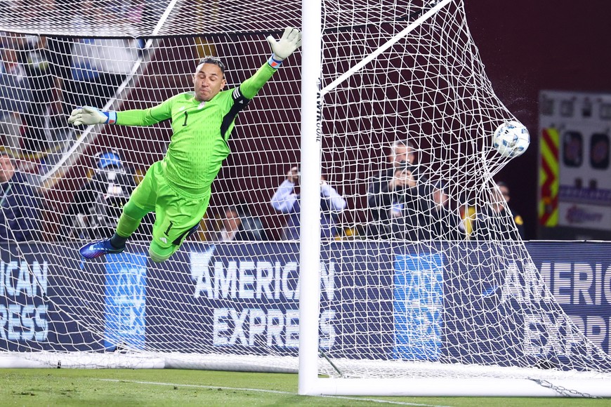 Mar 26, 2024; Los Angeles, Calfornia, USA; Costa Rica goalkeeper Keylor Navas (1) attempts to save a goal by Argentina forward Angel Di Maria (11) during the second half at LA Memorial Coliseum. Mandatory Credit: Jessica Alcheh-USA TODAY Sports