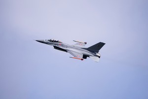 A Danish F-16 aircraft showcases some of its capabilities at a press event at Skrydstrup Airport where Argentina's Defense Minister Luis Alfonso Petri meets with Denmark's Defense Minister Troels Lund Poulsen, in Jutland, Denmark, April 16, 2024.  Ritzau Scanpix/Bo Amstrup via REUTERS    ATTENTION EDITORS - THIS IMAGE WAS PROVIDED BY A THIRD PARTY. DENMARK OUT. NO COMMERCIAL OR EDITORIAL SALES IN DENMARK.