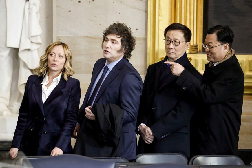 (L-R) Italy’s Prime Minister Giorgia Meloni, Argentina’s President Javier Milei, and China’s Vice President Han Zheng during US President Donald Trump’s inauguration as the 47th President of the United States in the rotunda of the United States Capitol in Washington, DC, USA, 20 January 2025. Trump’s planned outdoor inauguration ceremonies and events are being held inside today due to a forecast of extreme cold temperatures.    SHAWN THEW/Pool via REUTERS