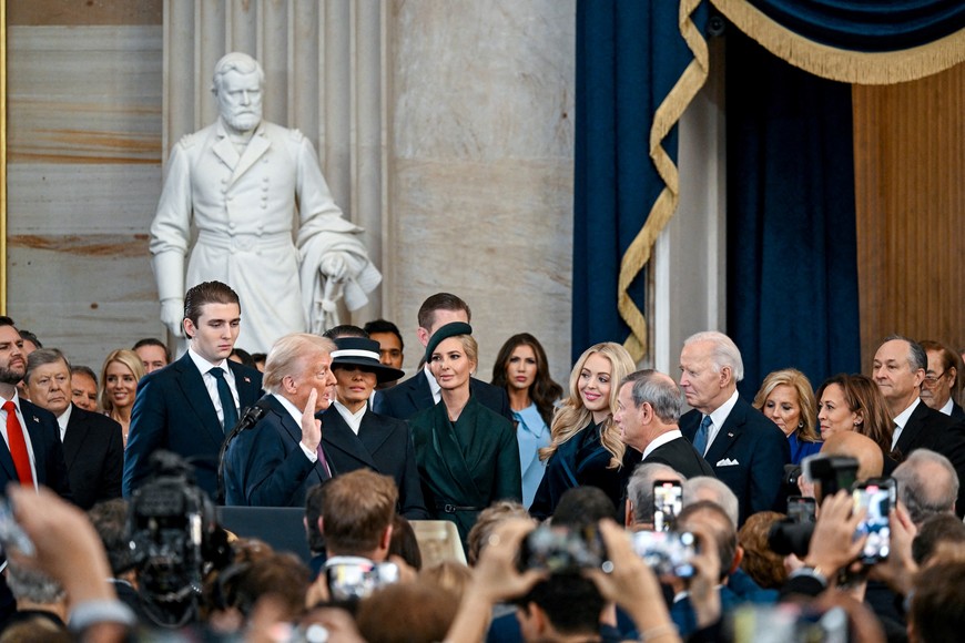 President-elect Donald J. Trump is sworn in during the ceremony for the inauguration of Donald Trump as the 47th president of the United States takes place inside the Capitol Rotunda of the U.S. Capitol building in Washington, D.C., Monday, January 20, 2025. It is the 60th U.S. presidential inauguration and the second non-consecutive inauguration of Trump as U.S. president. Kenny Holston/Pool via REUTERS     TPX IMAGES OF THE DAY