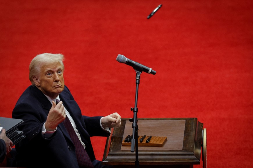 The U.S. President Donald Trump looks on after signing executive orders inside the Capital One Arena on the inauguration day of his second presidential term, in Washington, U.S. January 20, 2025. REUTERS/Brian Snyder           SEARCH "TRUMP INAUGURATION PICTURES" FOR THIS STORY. SEARCH "WIDER IMAGE" FOR ALL STORIES.           TPX IMAGES OF THE DAY