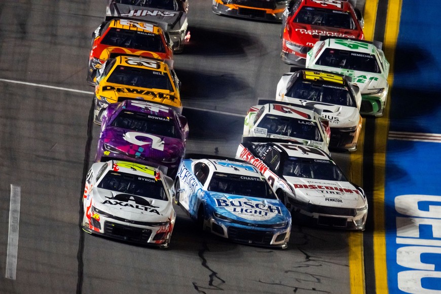 Feb 19, 2024; Daytona Beach, Florida, USA; NASCAR Cup Series driver William Byron (24) leads the field as Ross Chasten (1) and Austin Cindric (2) crash coming to the white flag during the Daytona 500 at Daytona International Speedway. Mandatory Credit: Mark J. Rebilas-USA TODAY Sports