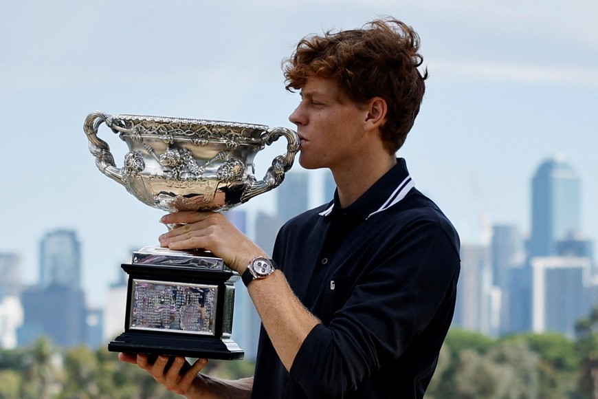 Tennis - Australian Open - Men's Singles Winner Photo Shoot - Albert Park Lake, Melbourne, Australia - January 27, 2025
Italy's Jannik Sinner poses with the Australian Open trophy REUTERS/Francis Mascarenhas