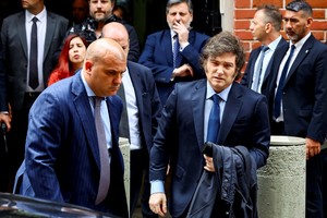 Argentine President Javier Milei leaves the Holocaust Museum after participating in a ceremony to commemorate International Holocaust Day, in Buenos Aires, Argentina January 27, 2025. REUTERS/Agustin Marcarian