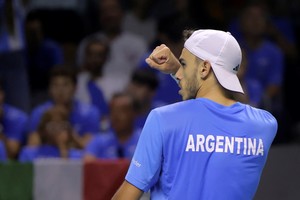 Tennis - Davis Cup Finals - Quarter Final - Italy v Argentina - Palacio de Deportes Jose Maria Martin Carpena Arena, Malaga, Spain - November 21, 2024
Argentina's Francisco Cerundolo reacts during his match against Italy's Lorenzo Musetti REUTERS/Jon Nazca