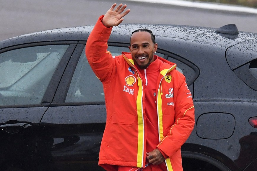 Formula One F1 - Lewis Hamilton drives a Ferrari F1 car around the Fiorano circuit as part of the TPC tests - Fiorano Circuit, Fiorano Modenese near Maranello, Italy - January 22, 2025
Ferrari's Lewis Hamilton waves at fans during testing REUTERS/Jennifer Lorenzini