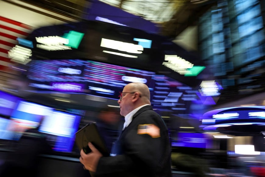 A trader works on the floor at the New York Stock Exchange (NYSE) in New York City, U.S., February 12, 2025.  REUTERS/Brendan McDermid