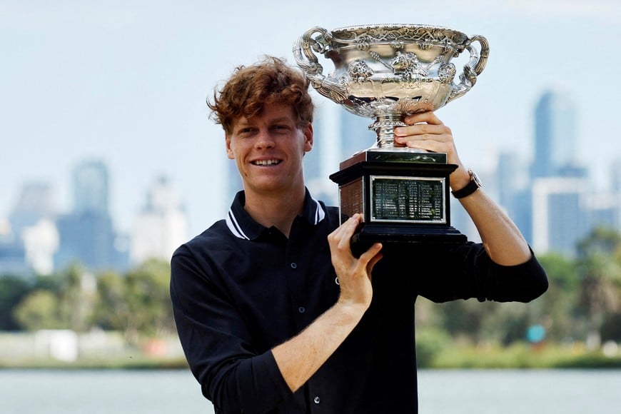 Tennis - Australian Open - Men's Singles Winner Photo Shoot - Albert Park Lake, Melbourne, Australia - January 27, 2025
Italy's Jannik Sinner poses with the Australian Open trophy REUTERS/Francis Mascarenhas     TPX IMAGES OF THE DAY