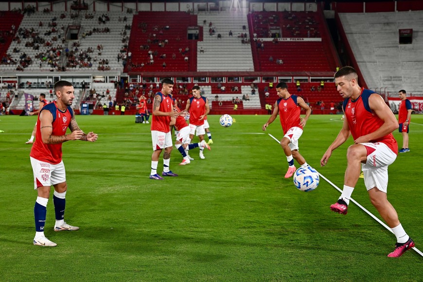 Gerometta y Ham en un primer plano del trabajo precompetitivo del domingo pasado en cancha de Huracán. Crédito: Juan Manuel Foglia