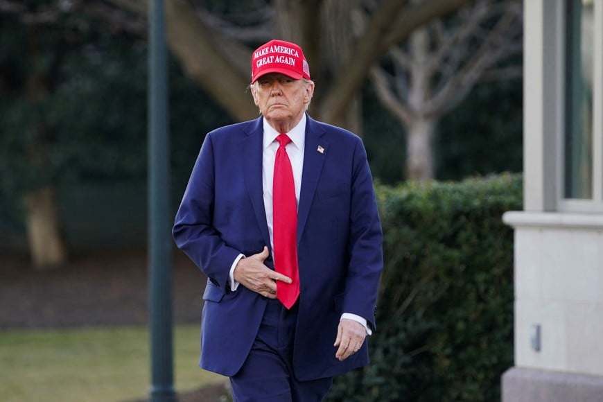 U.S. President Donald Trump walks before boarding Marine One at the White House, in Washington, D.C., U.S., February 28, 2025. REUTERS/Nathan Howard