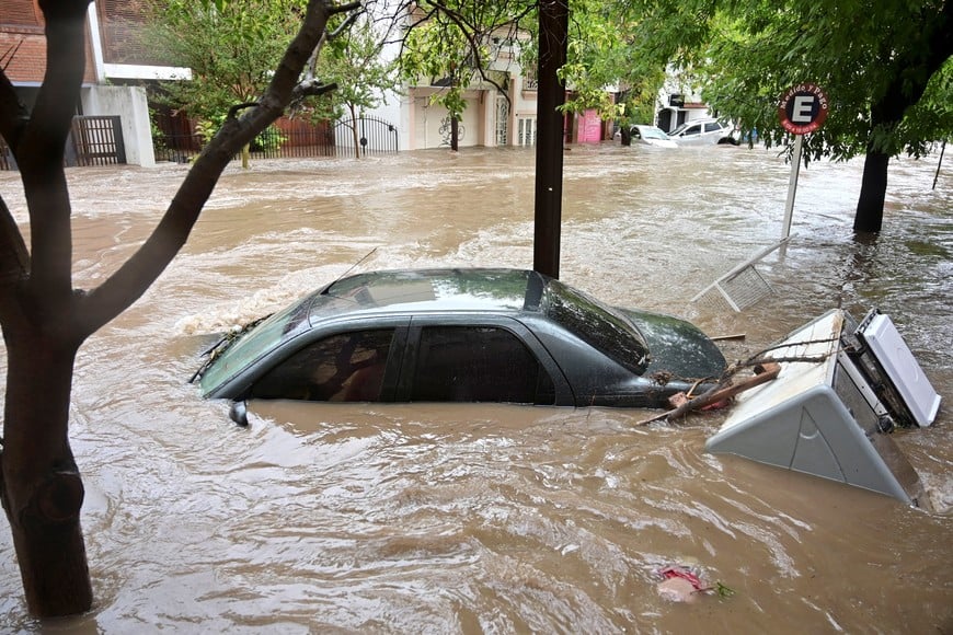 A car is seen during floodings in the city of Bahia Blanca, in the province of Buenos Aires, Argentina March 7, 2025. REUTERS/Juan Sebastian Lobos